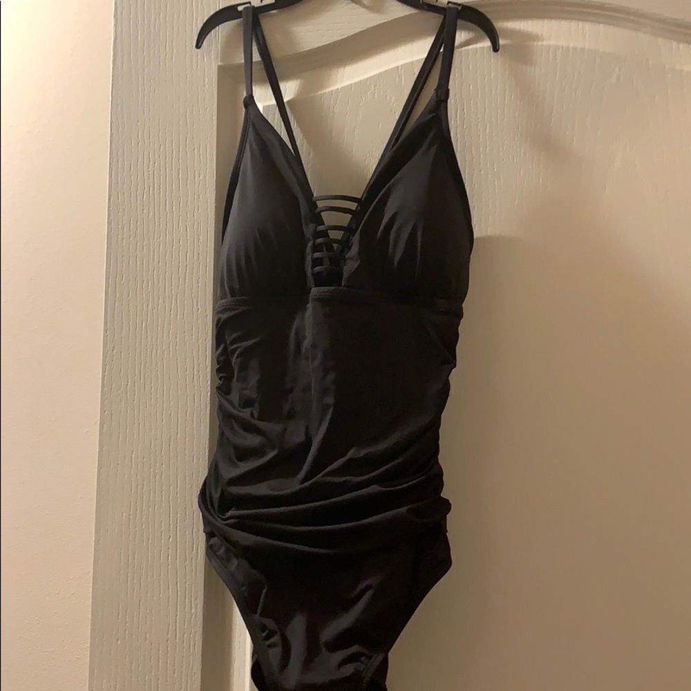 BRAND NEW, never worn sleek black bathing suit